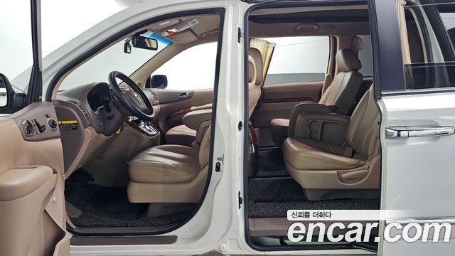 Kia Canival 2012 — photo 13
