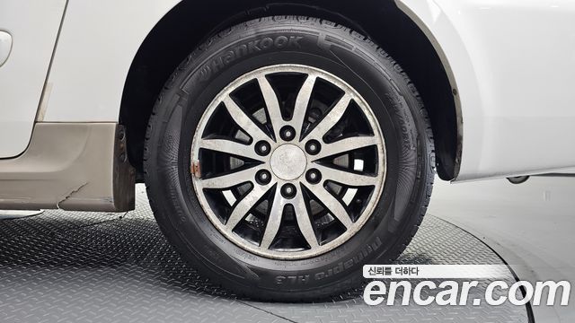 Kia Canival 2012 — photo 7