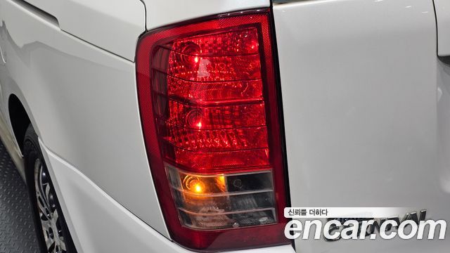 Kia Canival 2012 — photo 9