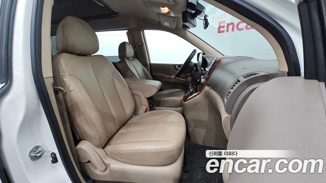 Kia Canival 2012 — photo 16