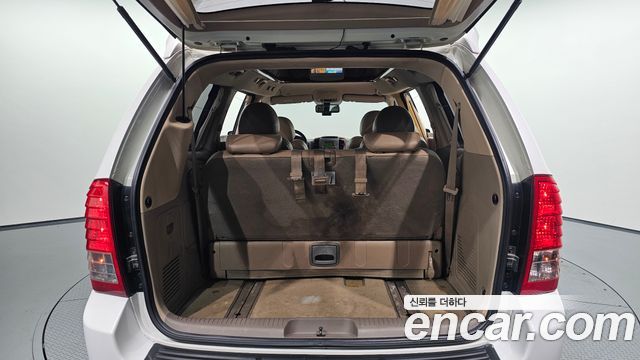 Kia Canival 2012 — photo 30