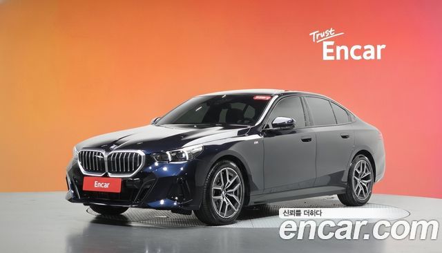 BMW 5-Series 2025 — photo 1