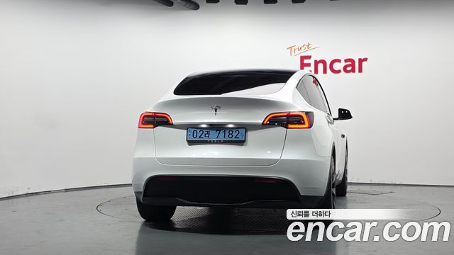 Tesla Model Y 2024 — photo 4