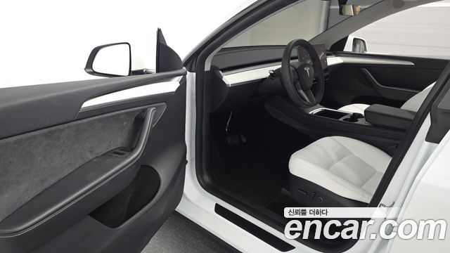 Tesla Model Y 2024 — photo 9