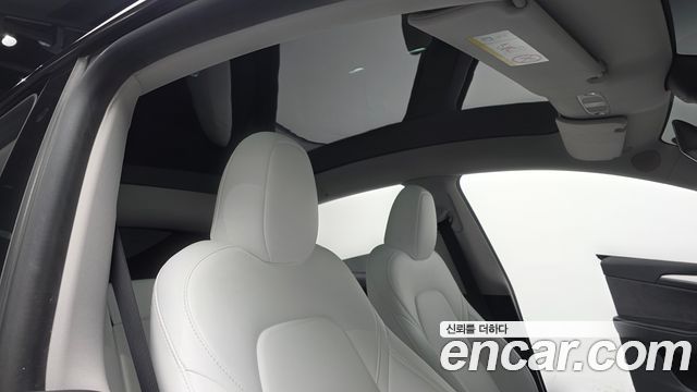 Tesla Model Y 2024 — photo 16