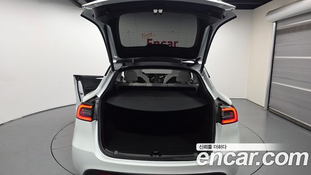 Tesla Model Y 2024 — photo 19