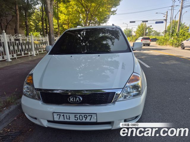 Kia Canival 2013 — photo 2