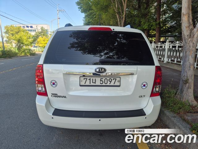 Kia Canival 2013 — photo 4
