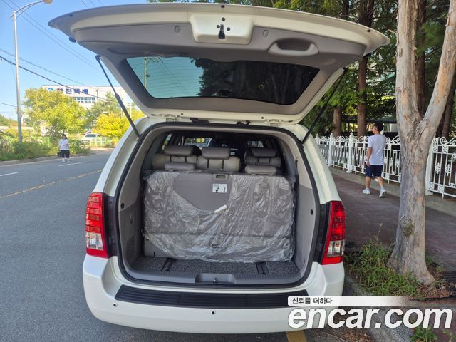 Kia Canival 2013 — photo 6