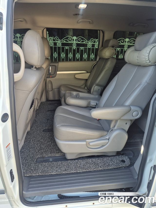 Kia Canival 2013 — photo 7