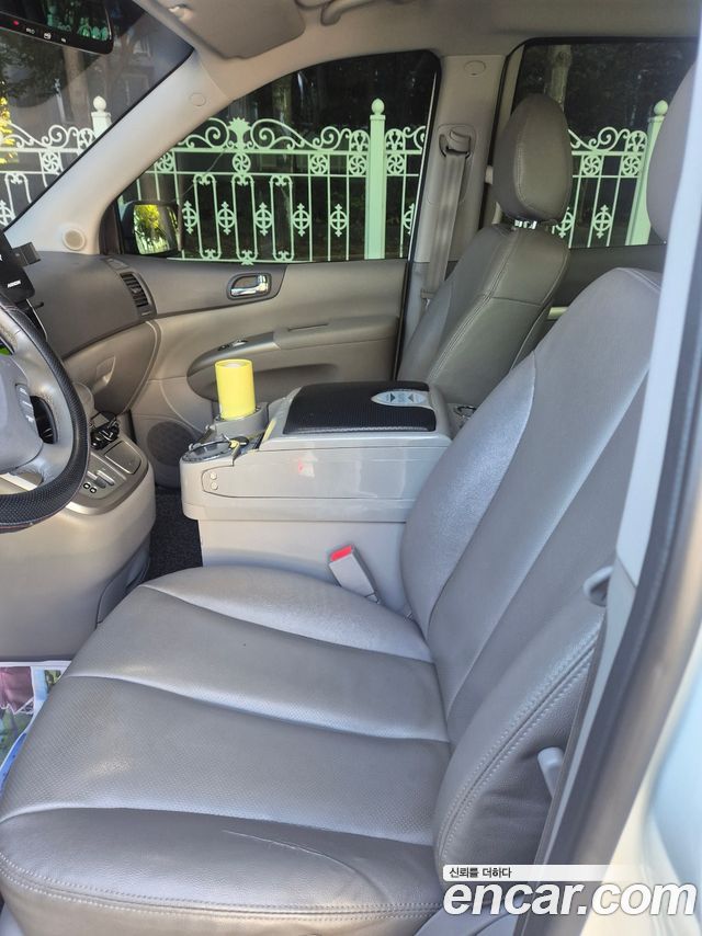 Kia Canival 2013 — photo 13