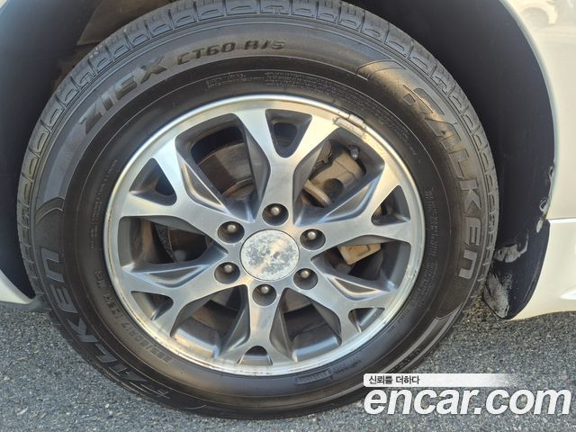 Kia Canival 2013 — photo 14