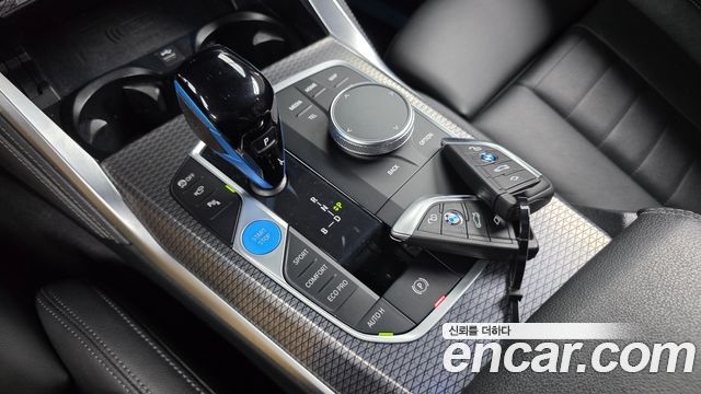 BMW i4 2022 — photo 12