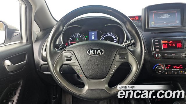 Kia K3 2013 — photo 13