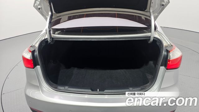 Kia K3 2013 — photo 15