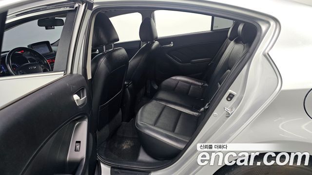 Kia K3 2013 — photo 16