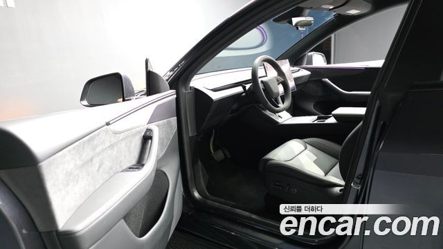 Tesla Model Y 2026 — photo 13