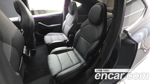 Tesla Model Y 2026 — photo 16