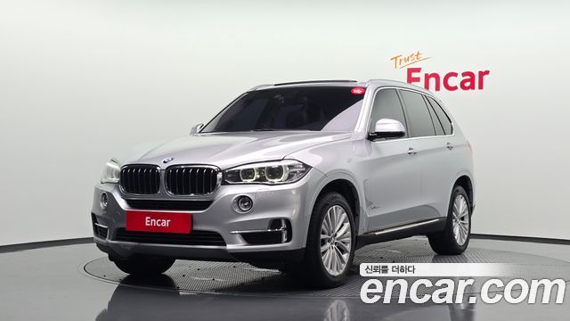 BMW X5 2014 — photo 1
