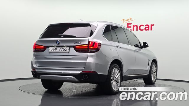 BMW X5 2014 — photo 2