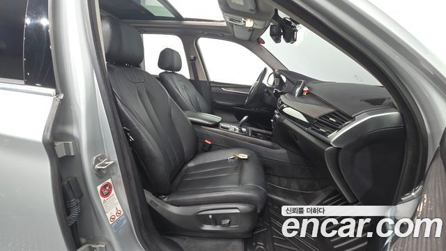 BMW X5 2014 — photo 16