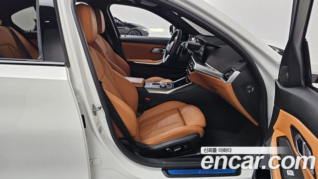 BMW 3-Series 2024 — photo 11