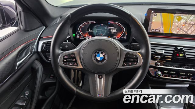 BMW 5-Series 2023 — photo 13