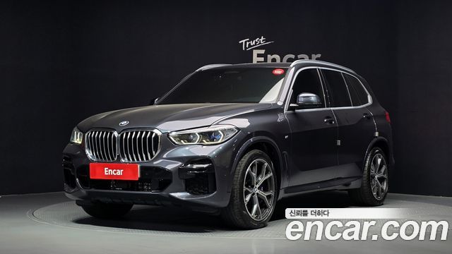 BMW X5 2022 — photo 1
