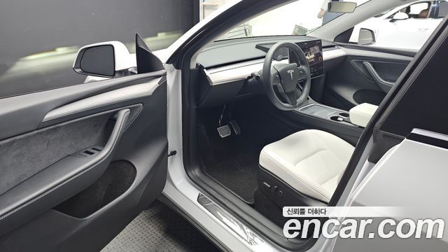 Tesla Model Y 2024 — photo 13