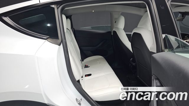 Tesla Model Y 2024 — photo 17