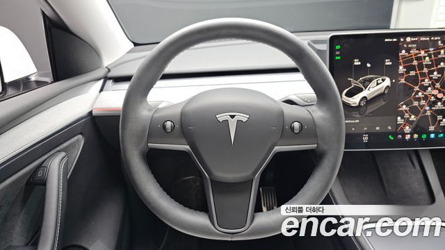 Tesla Model Y 2024 — photo 18