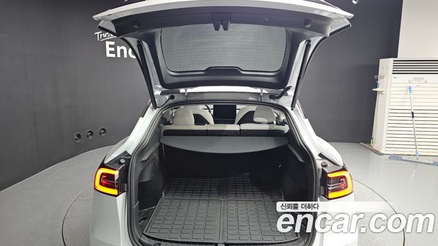 Tesla Model Y 2024 — photo 26