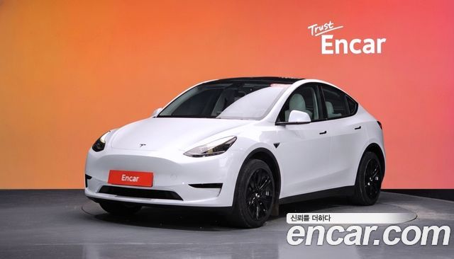 Tesla Model Y 2024 — photo 1