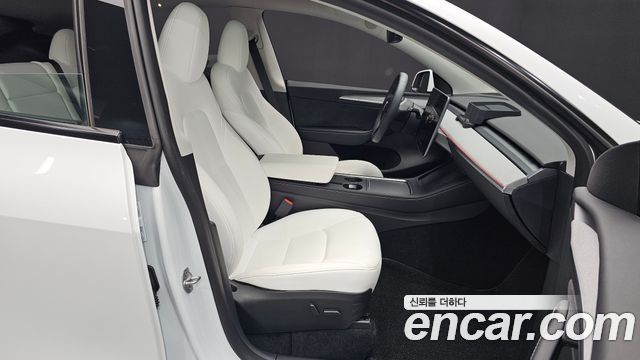 Tesla Model Y 2024 — photo 16