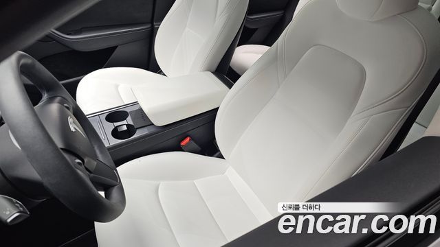 Tesla Model Y 2024 — photo 28