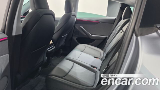 Tesla Model Y 2025 — photo 25