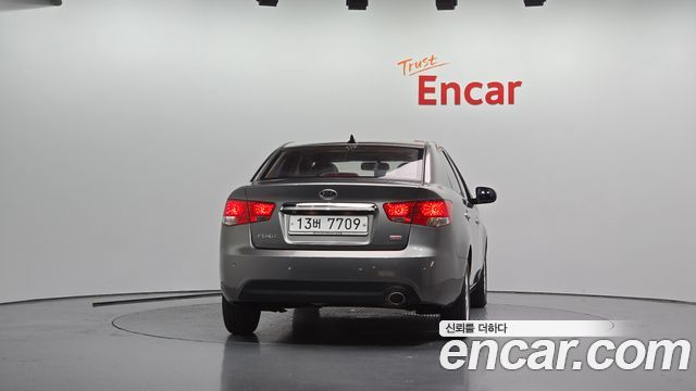Kia Porte 2011 — photo 4