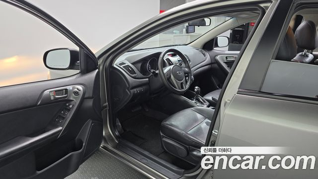 Kia Porte 2011 — photo 10