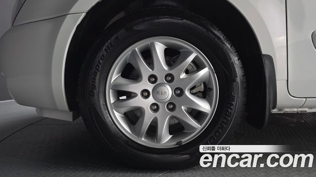 Kia Canival 2013 — photo 5