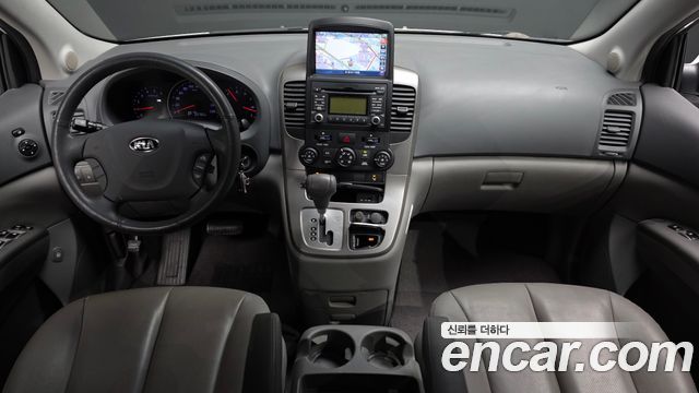 Kia Canival 2013 — photo 7
