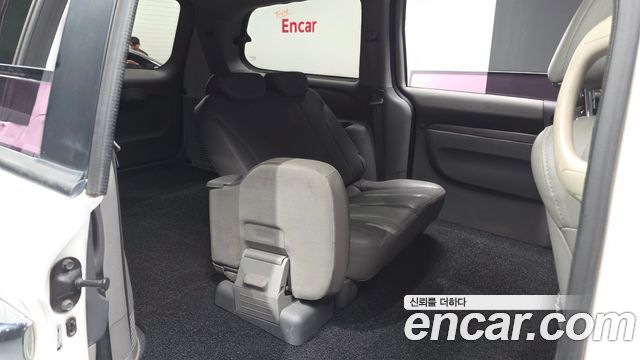 Kia Canival 2013 — photo 12