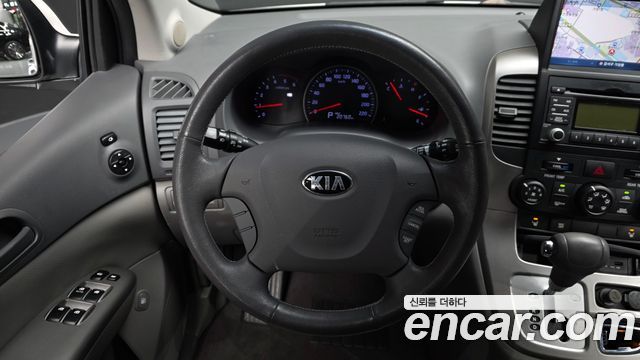 Kia Canival 2013 — photo 13