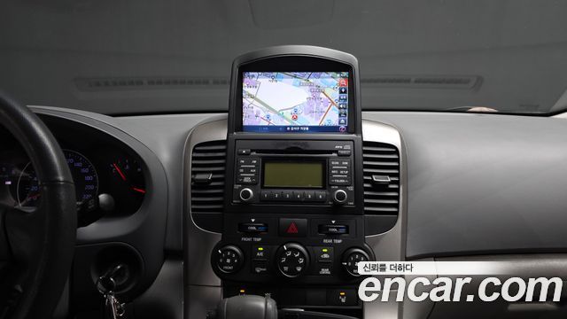 Kia Canival 2013 — photo 14