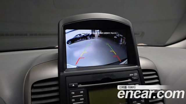 Kia Canival 2013 — photo 15