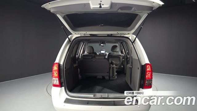 Kia Canival 2013 — photo 20