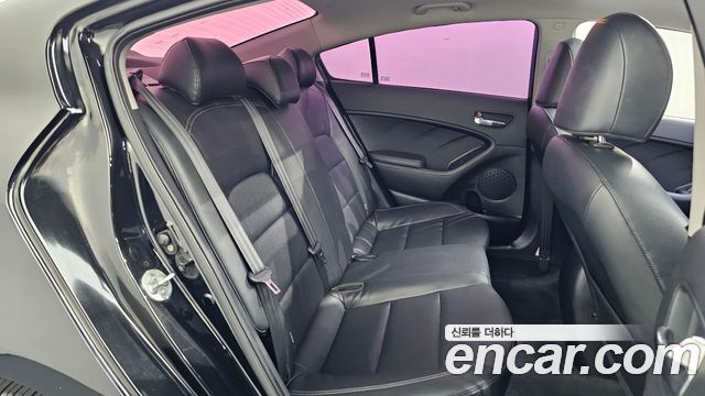 Kia K3 2013 — photo 18