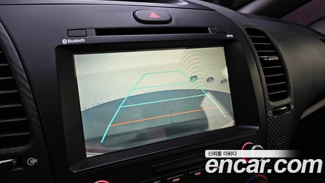 Kia K3 2013 — photo 21