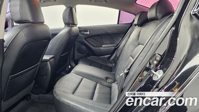 Kia K3 2013 — photo 16
