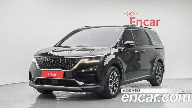 Kia Canival 2023 — photo 1