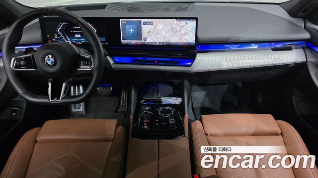 BMW 5-Series 2024 — photo 10